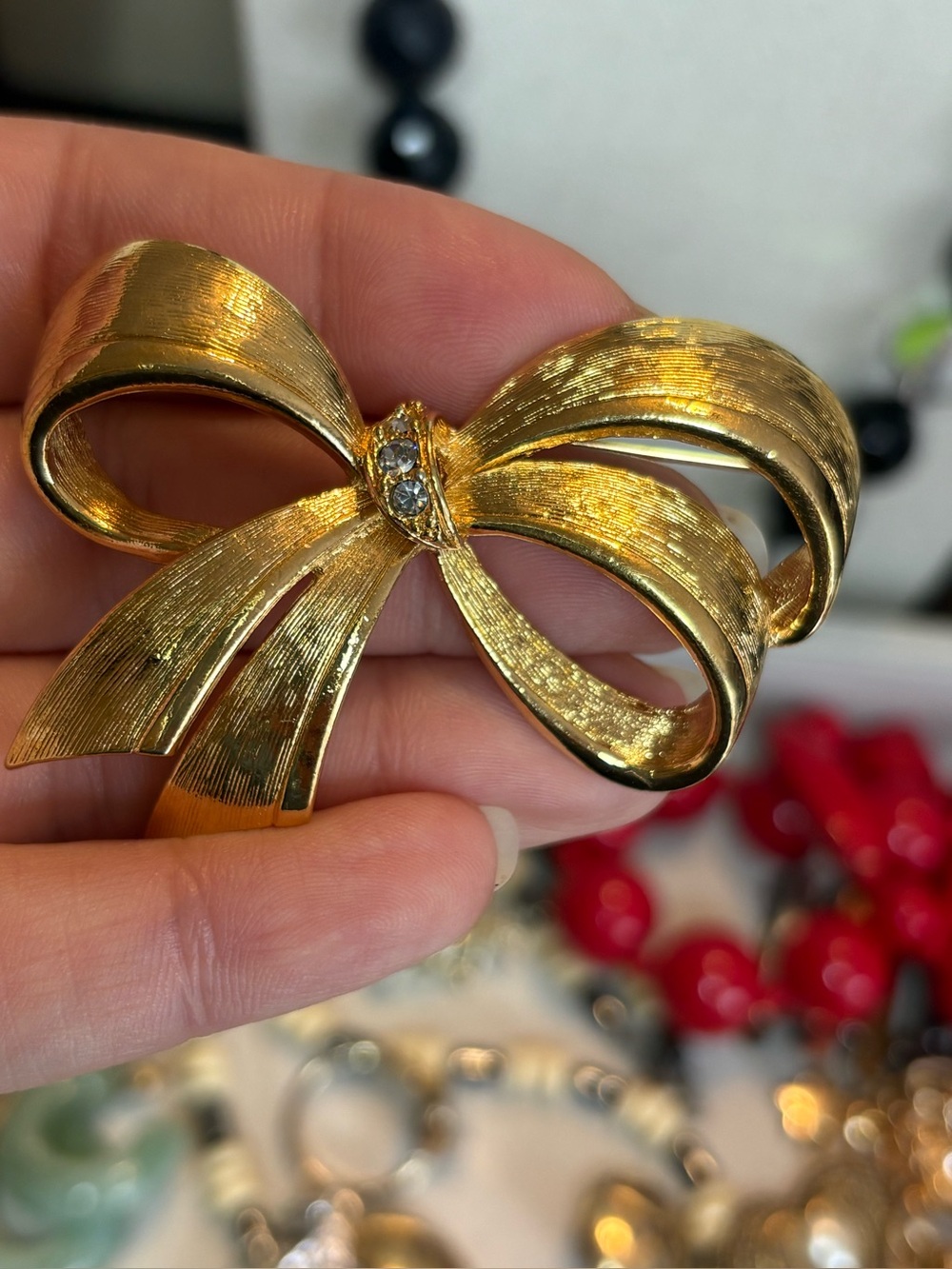 Vintage Avon Gold Tone Rhinestone Bow Brooch